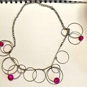 Silver necklace with magenta balls